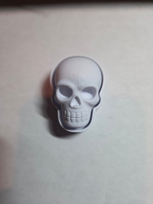 Skull clicker fidget, front view