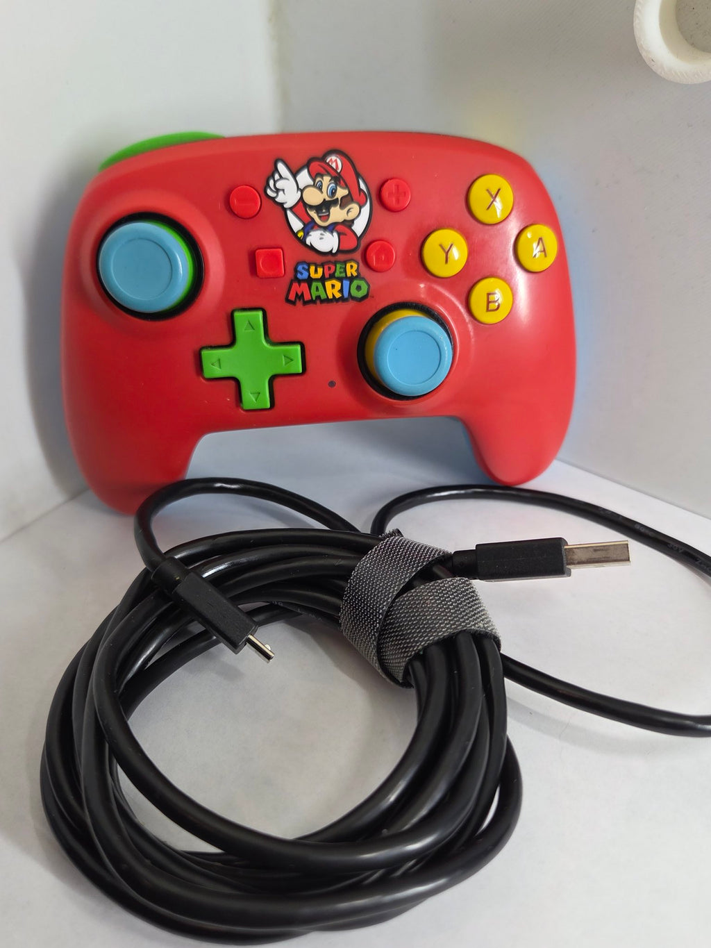 PowerA Mario red Switch controller, front view with cable