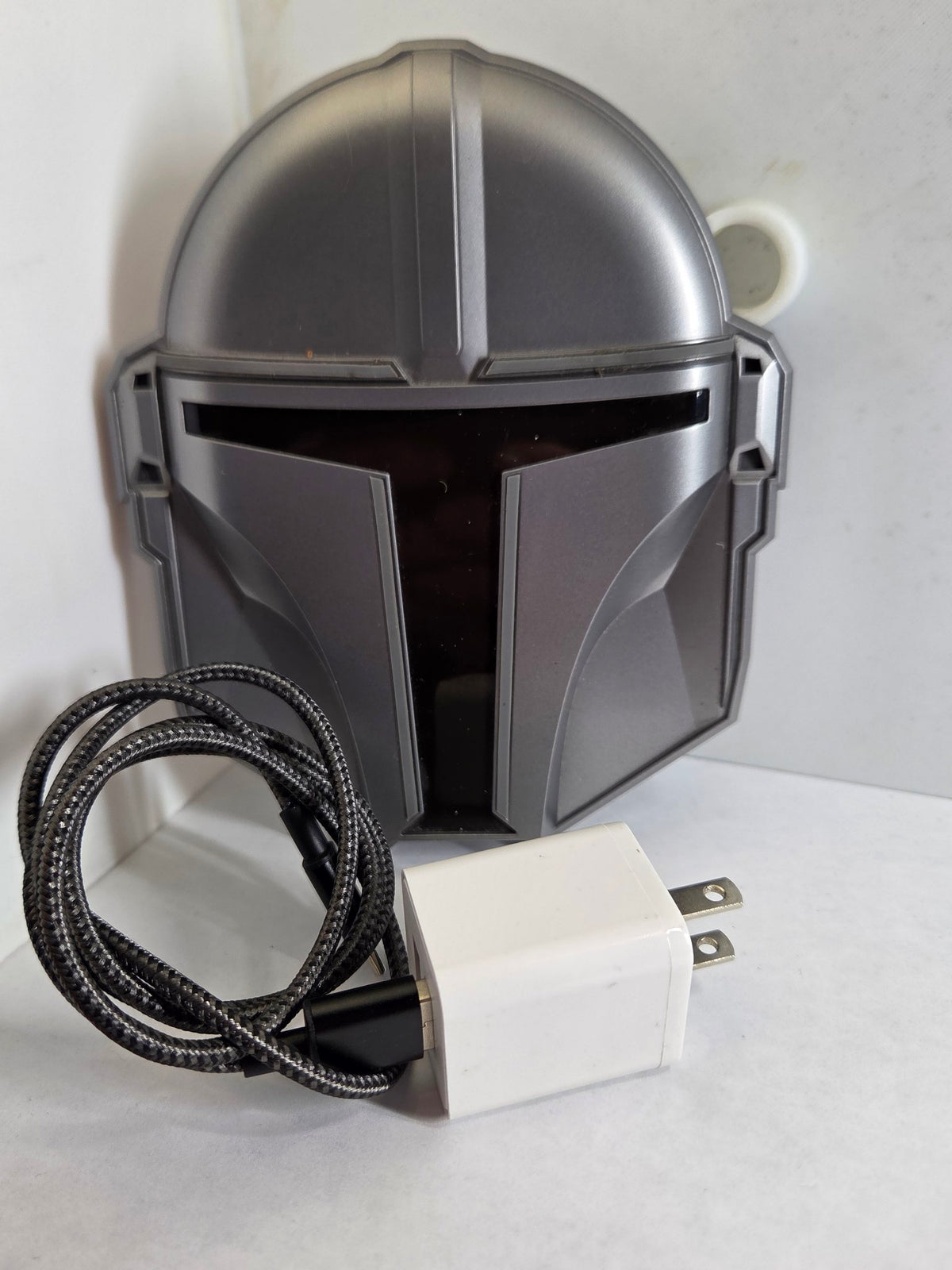 Mandalorian wireless charging pad, front view with cable