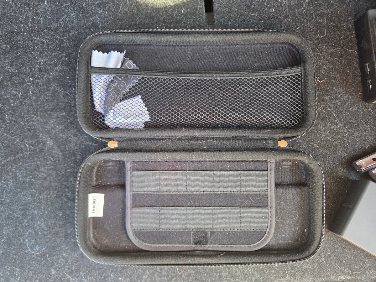 Carrying case open with game slots